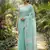 Elegant turquoise woven linen saree with contrast zari border & tassels     soft & breathable party wear