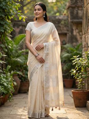 Elegant beige woven linen saree with contrast zari border & tassels  soft & breathable party wear 1