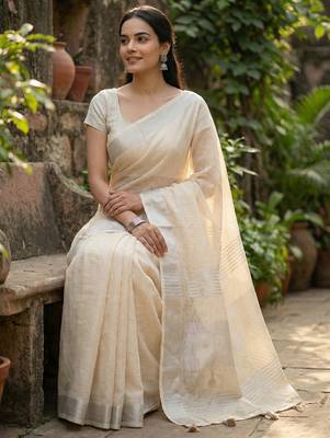 Elegant beige woven linen saree with contrast zari border & tassels  soft & breathable party wear 2