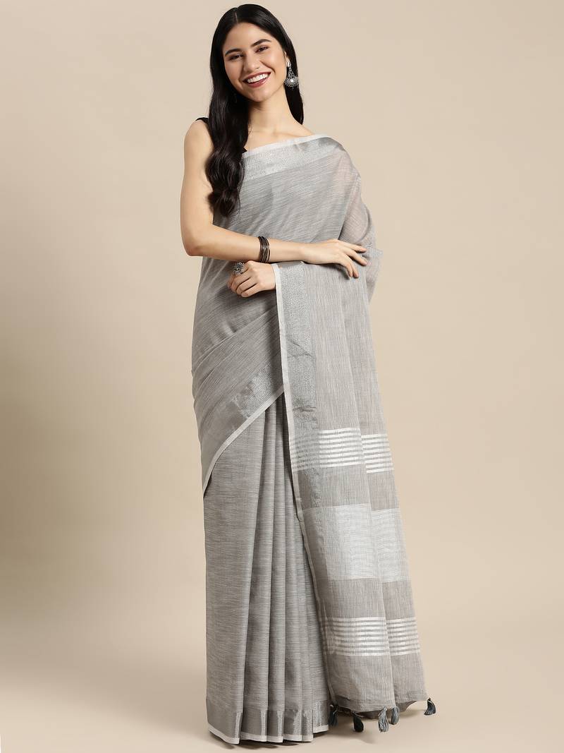 Elegant grey woven linen saree with contrast zari border & tassels     soft & breathable party wear