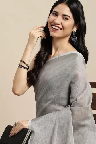Elegant grey woven linen saree with contrast zari border & tassels  soft & breathable party wear