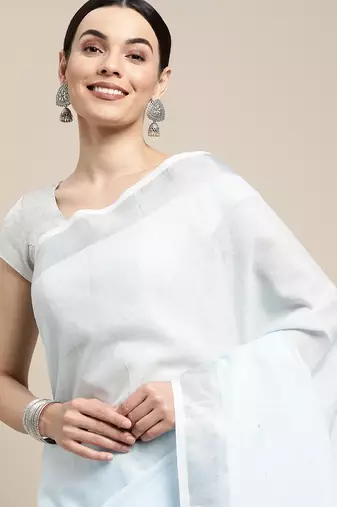 Elegant sky blue woven linen saree with contrast zari border & tassels  soft & breathable party wear