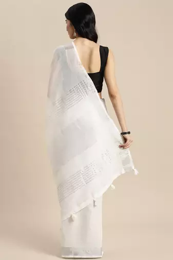 Elegant white woven linen saree with contrast zari border & tassels  soft & breathable party wear