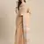 Elegant tan woven linen saree with contrast zari border & tassels   soft & breathable party wear