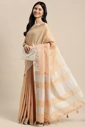 Elegant tan woven linen saree with contrast zari border & tassels  soft & breathable party wear