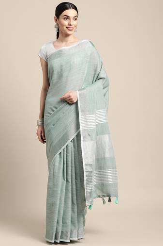 Elegant sea green woven linen saree with contrast zari border & tassels     soft & breathable party wear