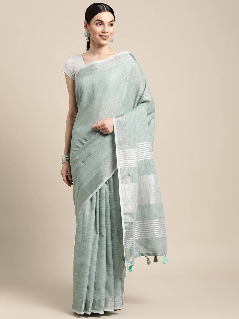 Elegant sea green woven linen saree with contrast zari border & tassels     soft & breathable party wear