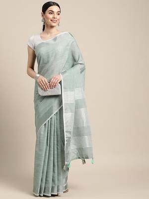 Elegant sea green woven linen saree with contrast zari border & tassels  soft & breathable party wear 2