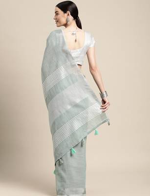 Elegant sea green woven linen saree with contrast zari border & tassels  soft & breathable party wear 5