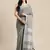 Elegant dark grey woven linen saree with contrast zari border & tassels     soft & breathable party wear