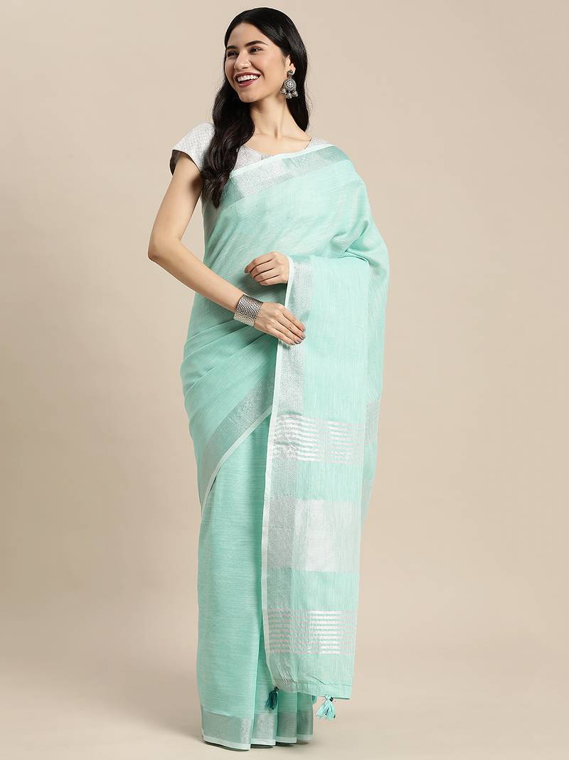 Elegant turquoise woven linen saree with contrast zari border & tassels     soft & breathable party wear