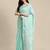 Elegant turquoise woven linen saree with contrast zari border & tassels     soft & breathable party wear