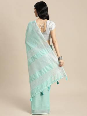 Elegant turquoise woven linen saree with contrast zari border & tassels  soft & breathable party wear 4