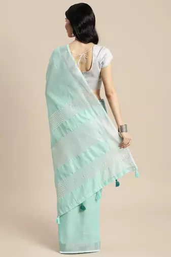 Elegant turquoise woven linen saree with contrast zari border & tassels  soft & breathable party wear