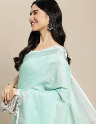 Elegant turquoise woven linen saree with contrast zari border & tassels  soft & breathable party wear 5