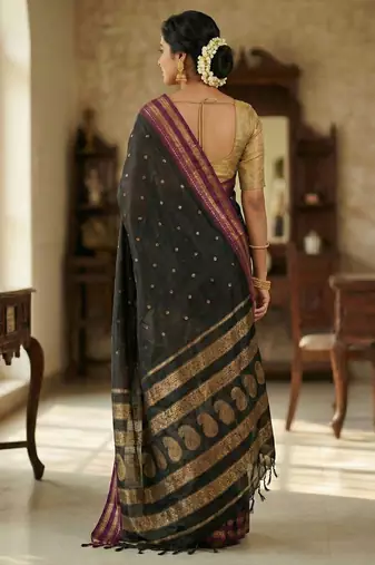 The midnight luxurious black soft silk blend saree with magenta & gold zari border