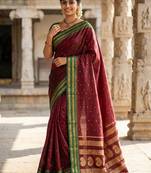 The regal ruby: deep maroon soft silk saree with contrast emerald green border