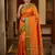 The sunset glow: vibrant orange soft silk saree with contrast green zari border