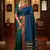 The peacock hue: teal blue soft silk saree with contrast red zari border