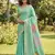 Women sea green & pink floral printed linen silk blend saree