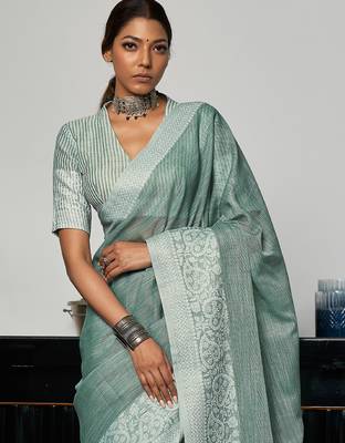 Women teal green & silver-toned woven design linen blend saree 2