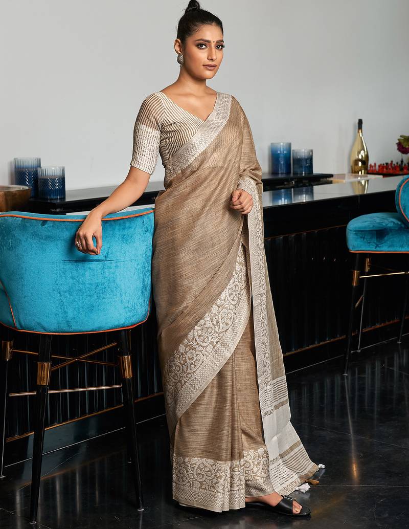 Women beige & silver-toned woven design linen blend saree