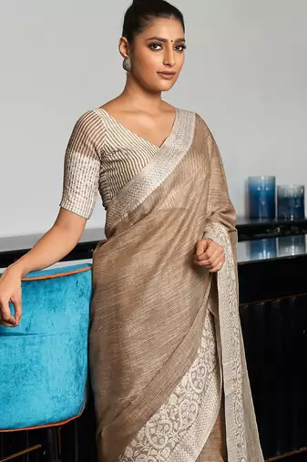 Women beige & silver-toned woven design linen blend saree