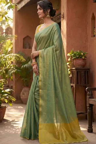 teal green & gold-toned solid tissue silk blend saree with zari border