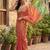 coral peach & green solid tissue silk blend saree with contrast border