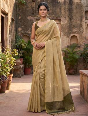 beige & olive green solid tissue silk blend saree with zari border 1