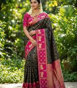 black soft silk blend saree with pink nandi zari temple border