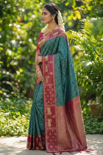teal blue soft silk blend saree with pink nandi zari border
