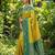 yellow soft silk blend saree with green nandi zari border