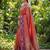 rust orange soft silk blend saree with purple nandi zari border