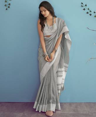 Women teal green & silver-toned woven design linen blend saree 2