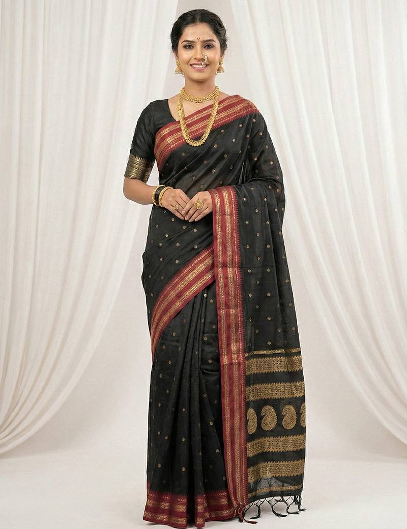 the midnight luxurious black soft silk blend saree with magenta & gold zari border