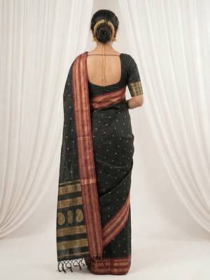 the midnight luxurious black soft silk blend saree with magenta & gold zari border 3