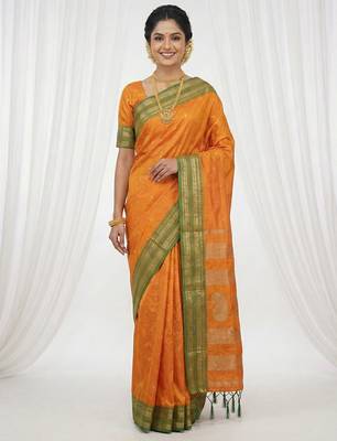 the sunset glow: vibrant orange soft silk blend saree with contrast green zari border 1