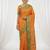 the sunset glow: vibrant orange soft silk blend saree with contrast green zari border