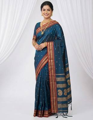 the peacock hue: teal blue soft silk blend saree with contrast red zari border 1