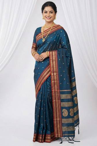 the peacock hue: teal blue soft silk blend saree with contrast red zari border