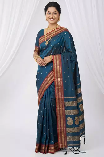 the peacock hue: teal blue soft silk blend saree with contrast red zari border