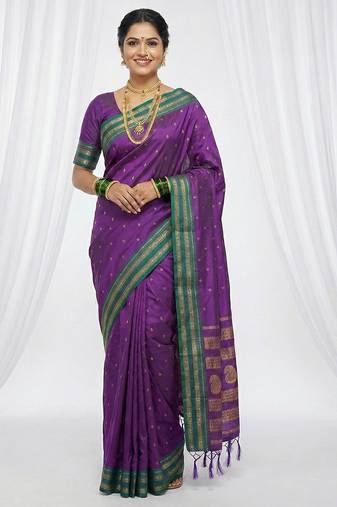 the peacock hue: violet soft silk blend saree with contrast green zari border
