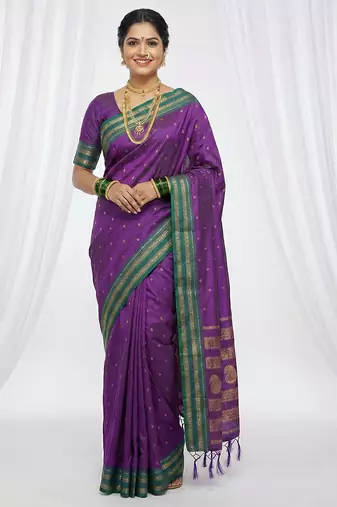 the peacock hue: violet soft silk blend saree with contrast green zari border