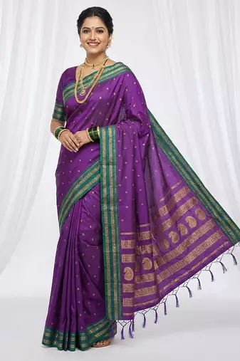 the peacock hue: violet soft silk blend saree with contrast green zari border