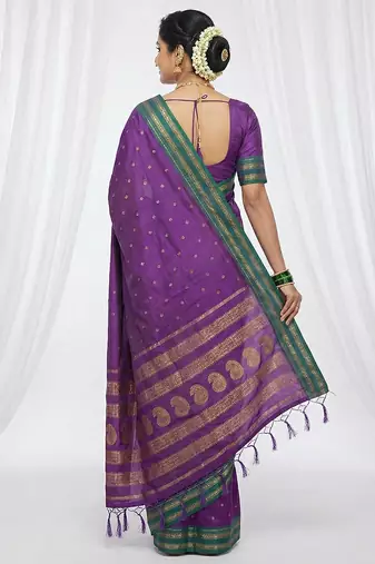 the peacock hue: violet soft silk blend saree with contrast green zari border