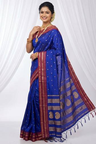 the peacock hue: blue soft silk blend saree with contrast red zari border