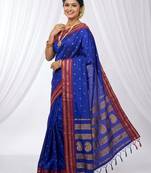the peacock hue: blue soft silk blend saree with contrast red zari border