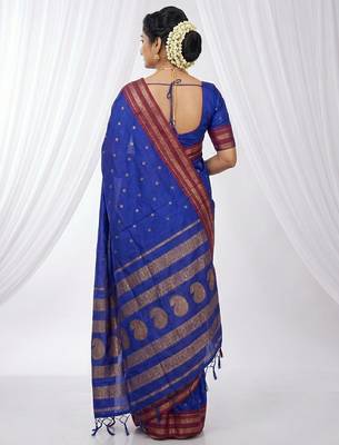 the peacock hue: blue soft silk blend saree with contrast red zari border 2
