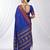 the peacock hue: blue soft silk blend saree with contrast red zari border